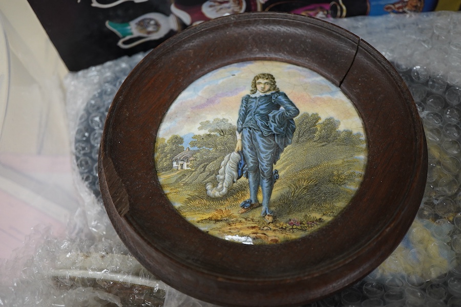 A group of ten pot lids and two related books